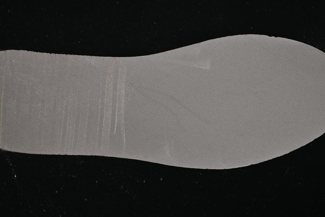 Close-up of the red outsole tread