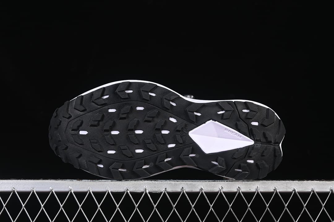 Underside view showing the patterned tread.