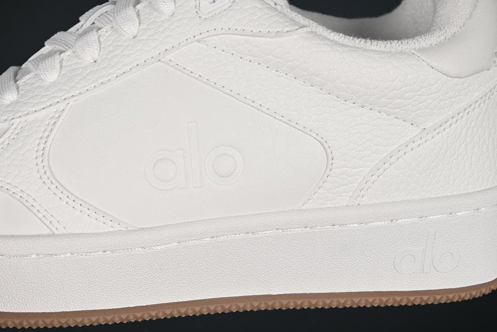 Close-up of the textured side panels and embossed Alo logo