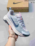 Light blue and white Nike Wildhorse 10 trail running shoe with a lugged outsole