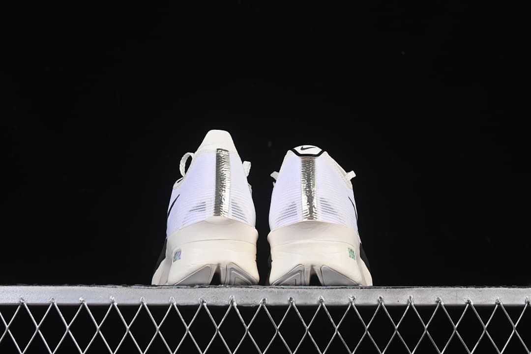 Rear view of the pair showing heel details and soles