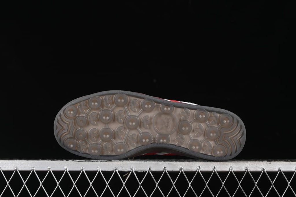 Underside of the sneaker showing a patterned grey translucent-looking outsole.