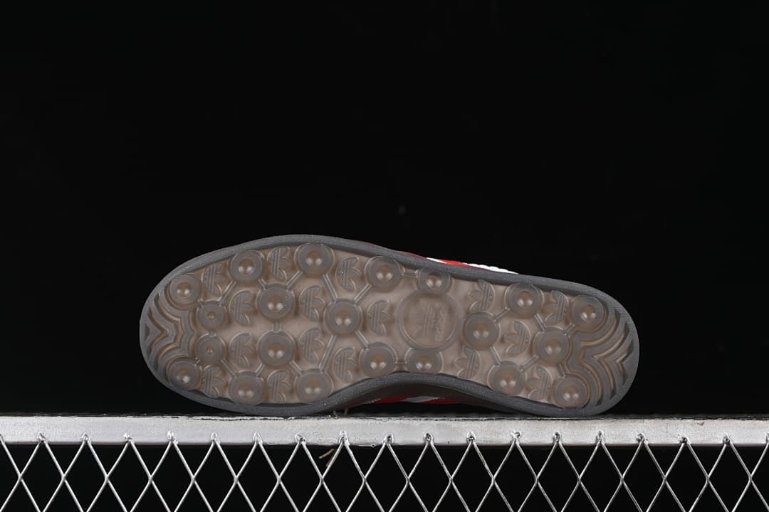 Underside of the sneaker showing a patterned grey translucent-looking outsole.