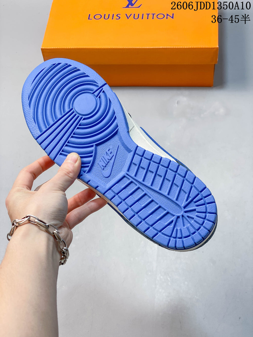 Blue patterned outsole of a low-top Nike sneaker