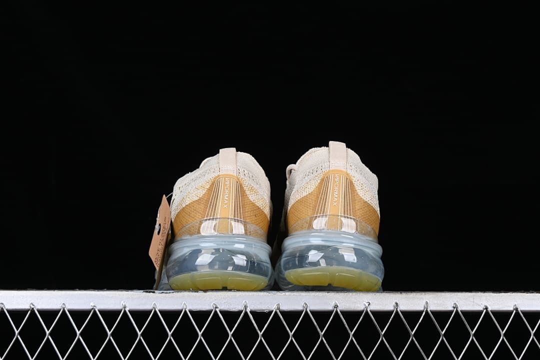 Rear view of both shoes showing heel details and transparent sole units.
