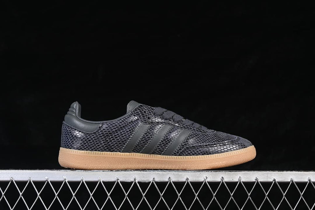 Side profile highlighting the dark patterned upper, tonal stripes and gum-colored sole
