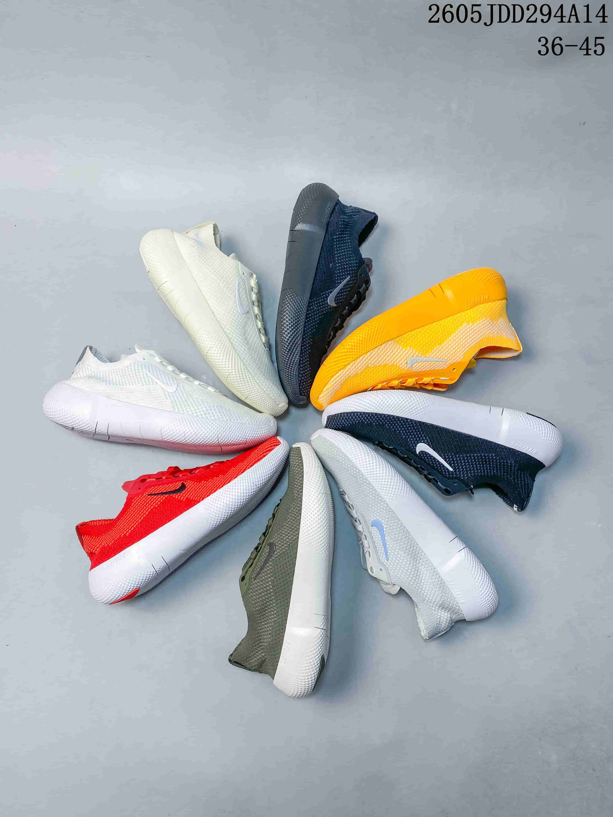 Several Nike Free low-top sneakers arranged in a circle in assorted colors.