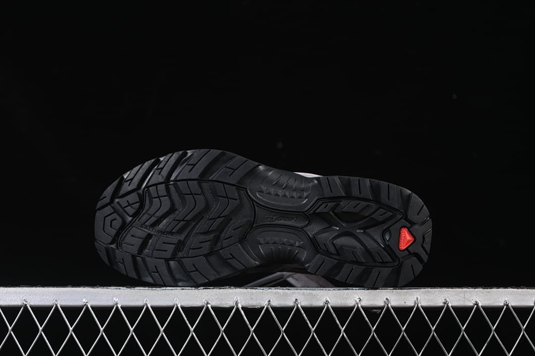 Underside view showing the black lugged outsole