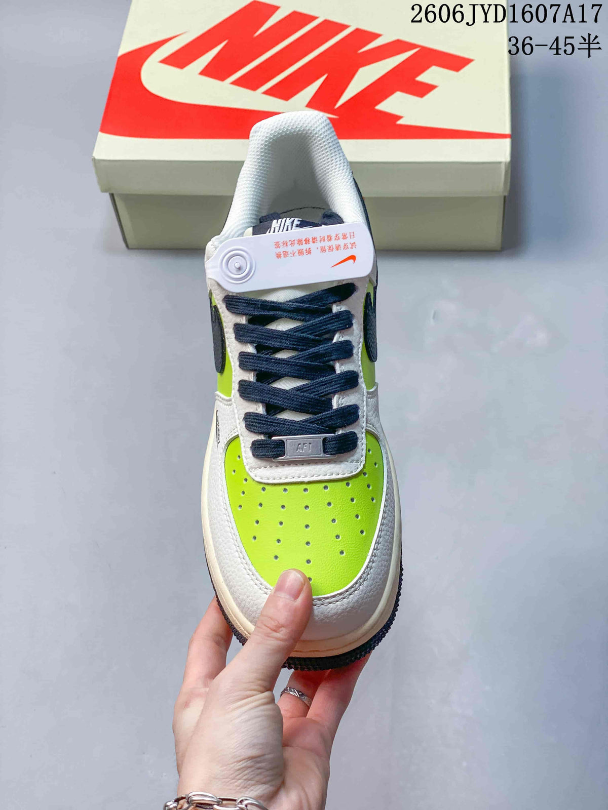 Top view highlighting the perforated lime toe, navy laces and white overlays.