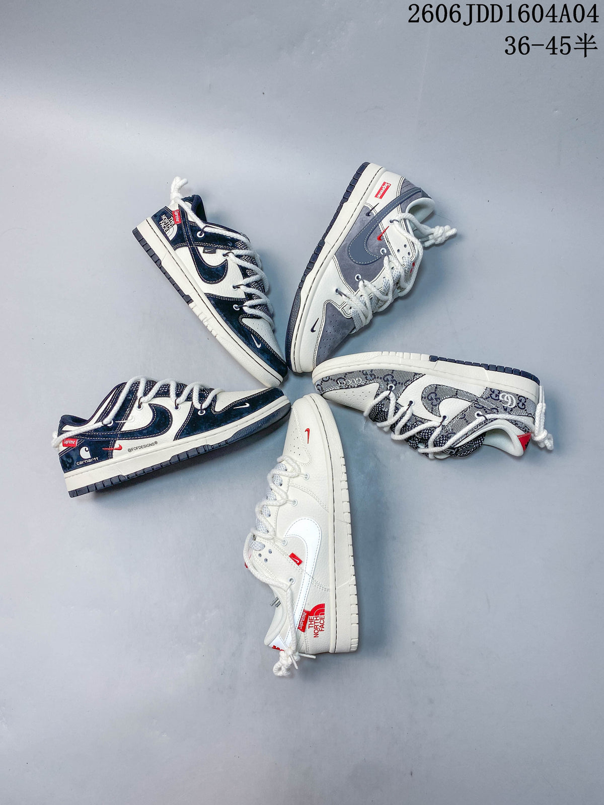 Overhead arrangement of several low-top sneaker designs in navy, cream, gray, and patterned finishes.