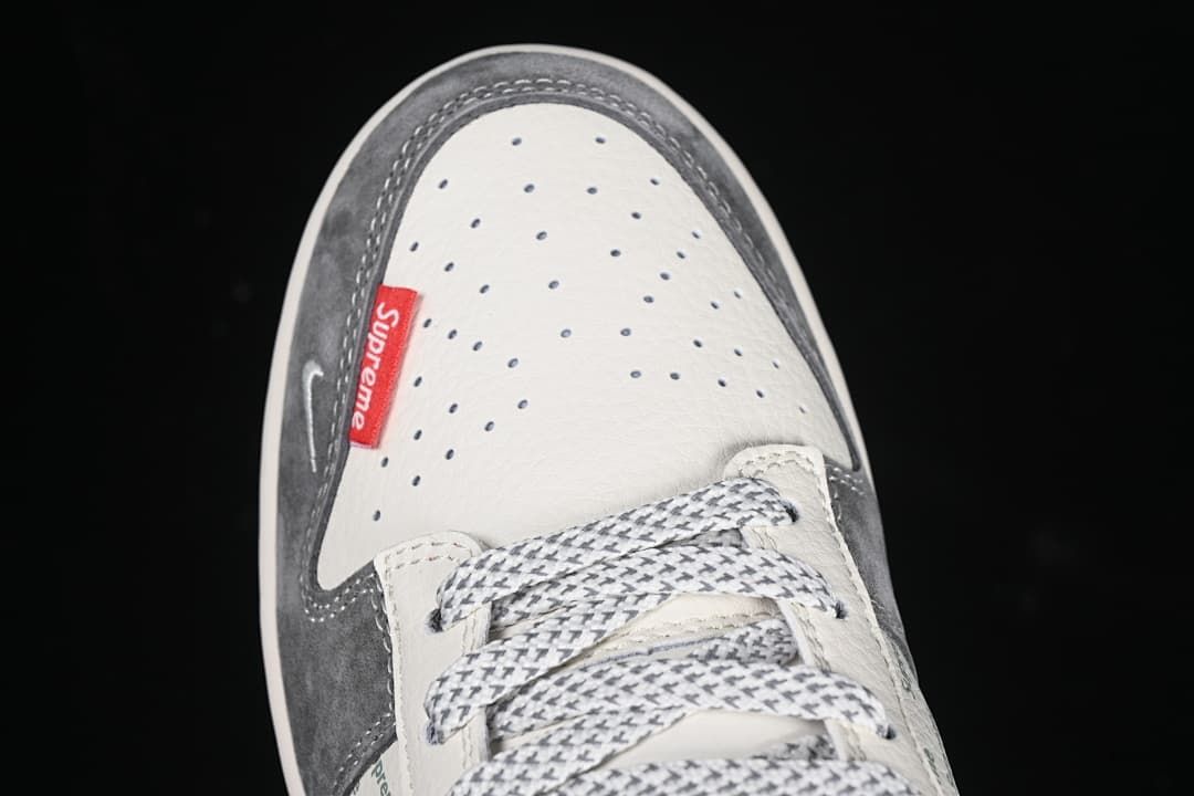 Top view of the perforated toe box and patterned laces