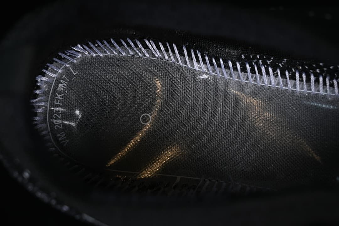 Close-up of the shoe interior and stitching