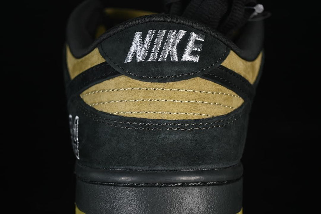 Rear view showing Nike heel embroidery and layered panels