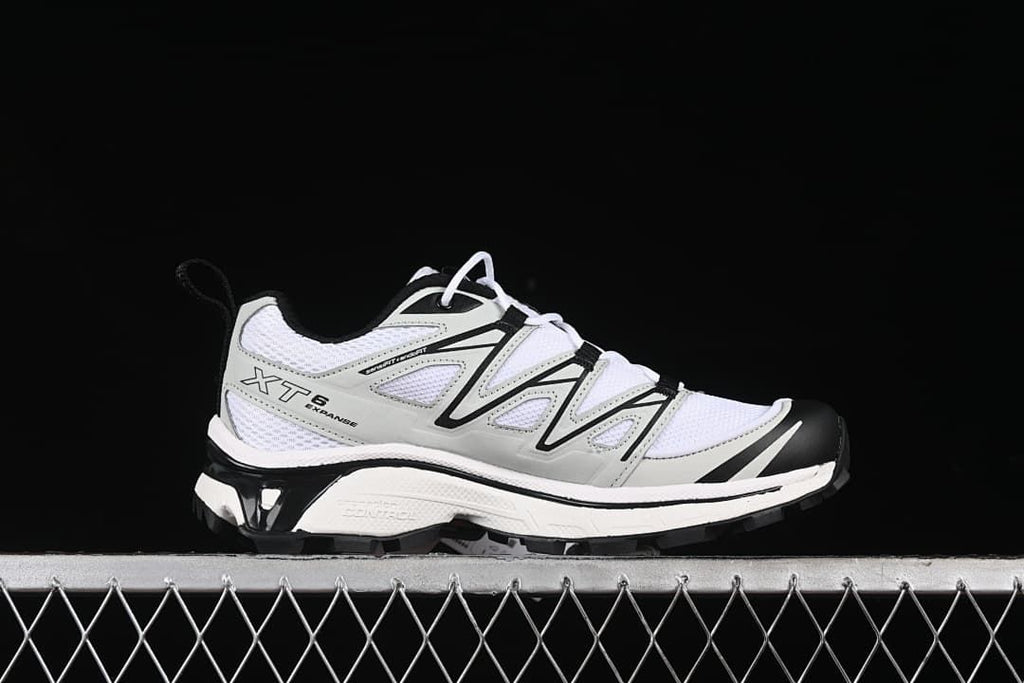 Side profile of a single XT-6 Expanse sneaker.