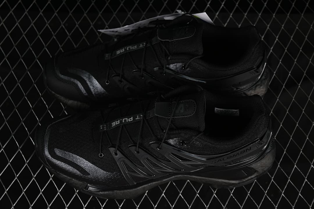 Pair of black shoes shown from above