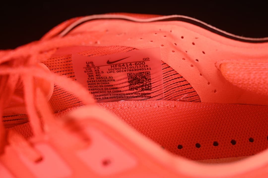 Close-up of the tongue size label showing style code HF6414-600 and a sample size of EU 42.
