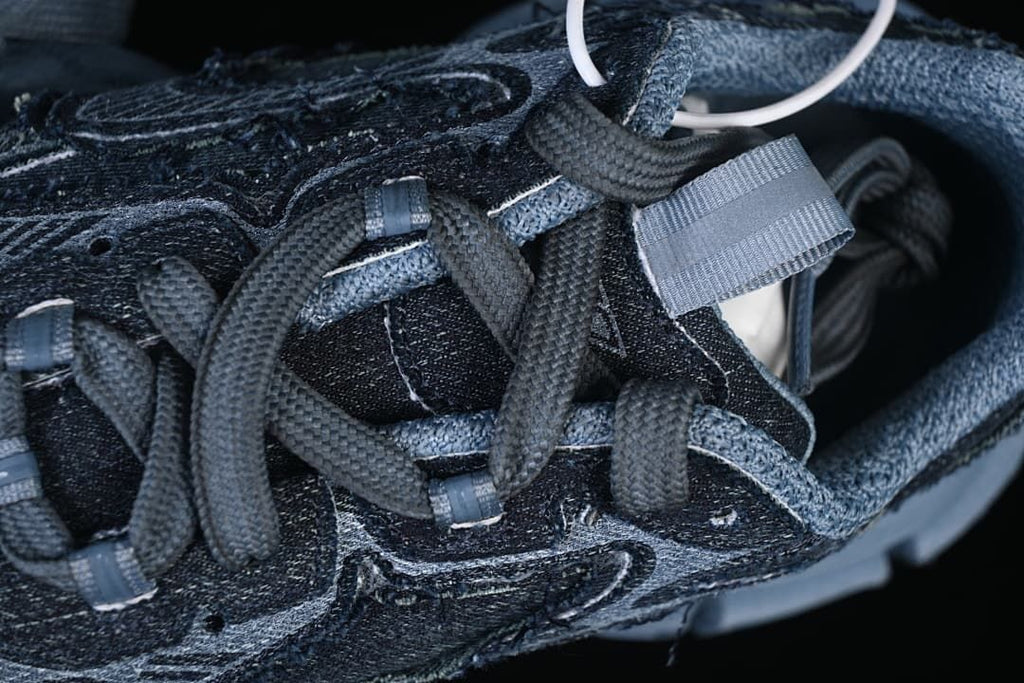 Close-up of laces and layered upper details