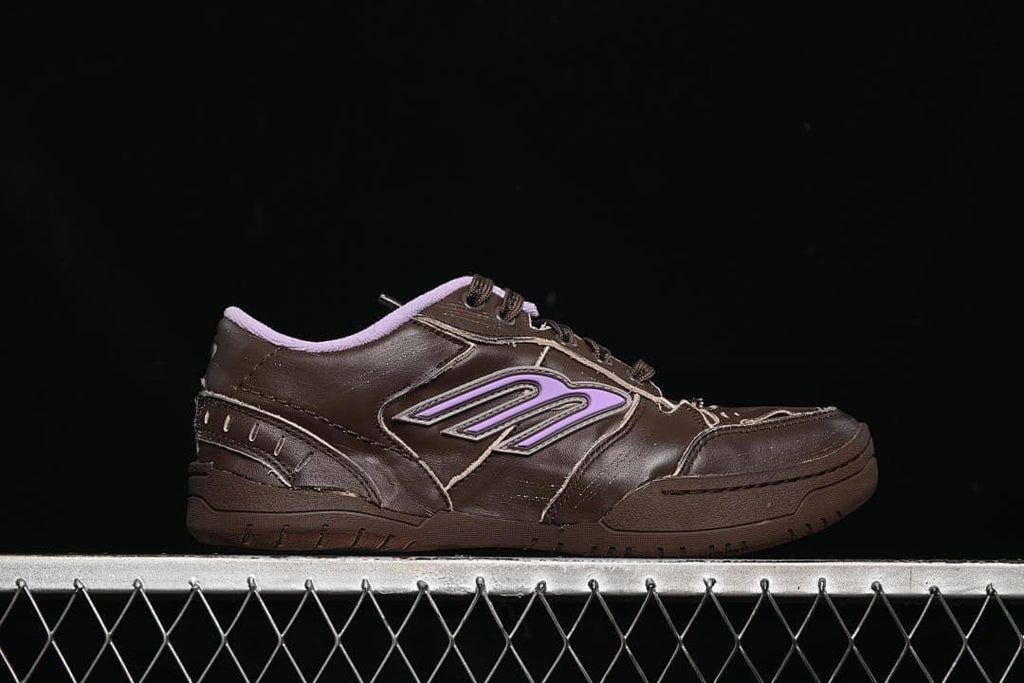 Side profile of the brown sneaker with lavender side accent