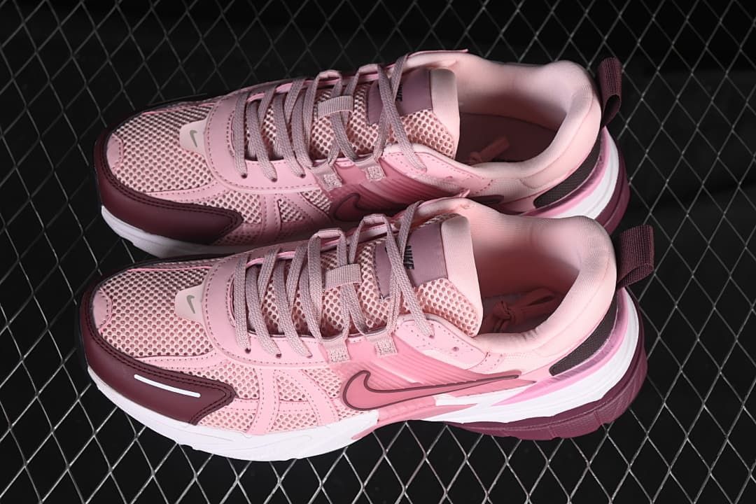 Pair of pink and burgundy V2K Run sneakers viewed from above