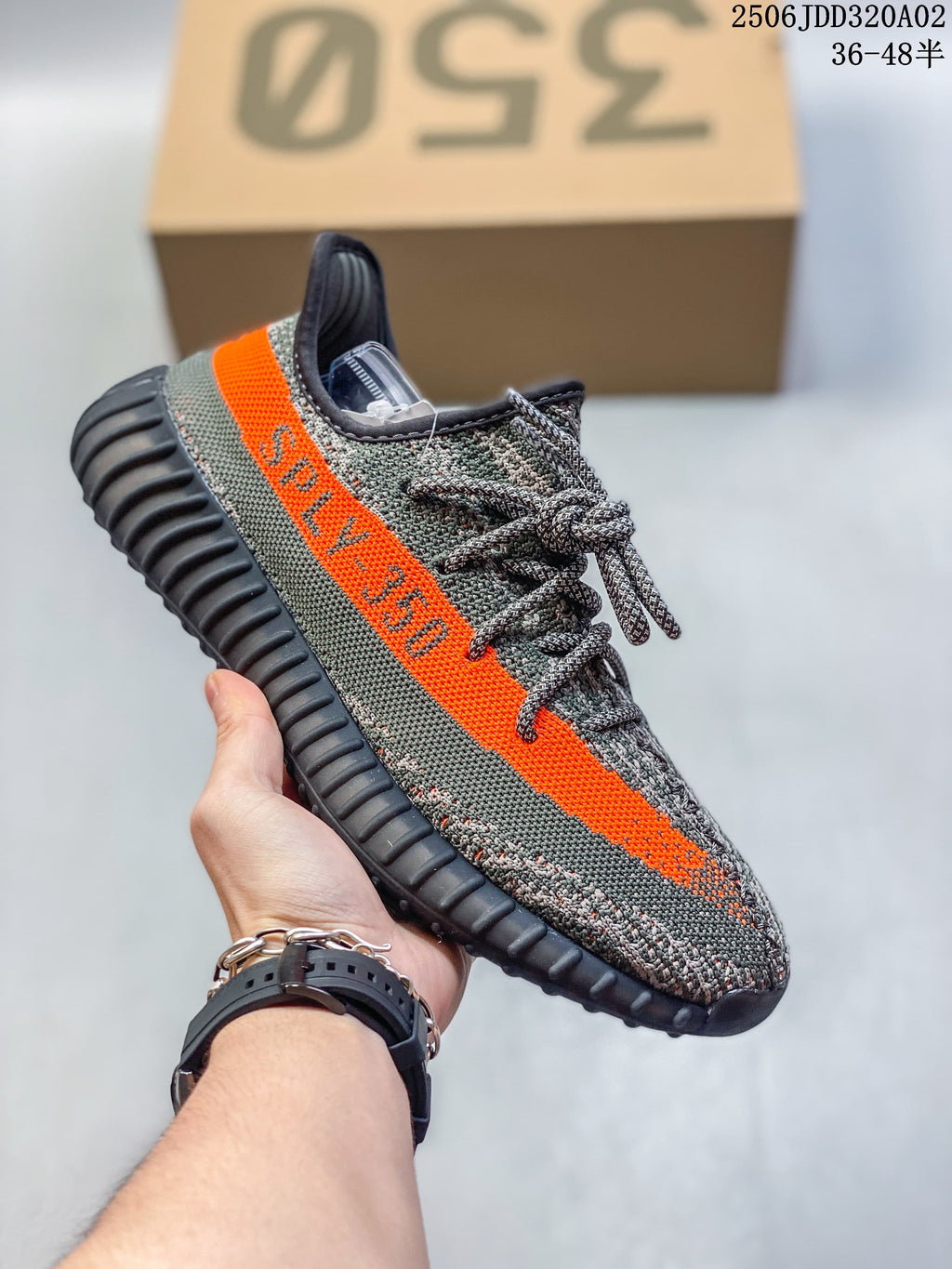 Gray-green Adidas Yeezy-style sneaker with a bright orange stripe
