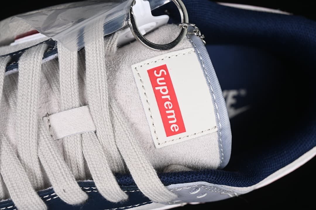 Close-up of tongue branding, laces and attached tag