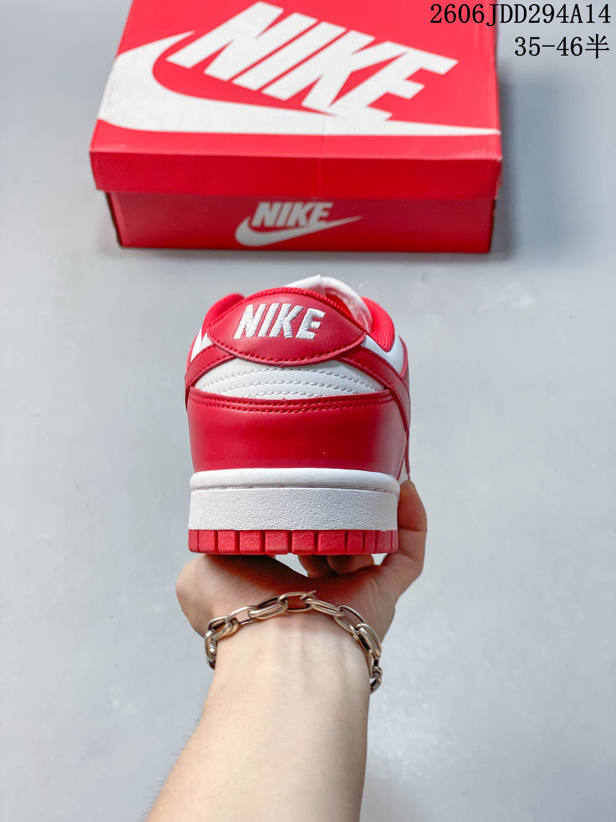 Rear view of a red and white Nike Dunk Low sneaker.