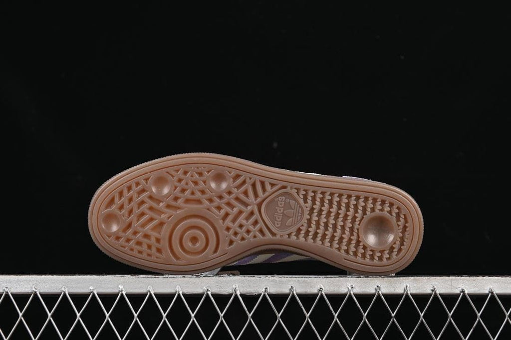 Underside showing the brown patterned outsole