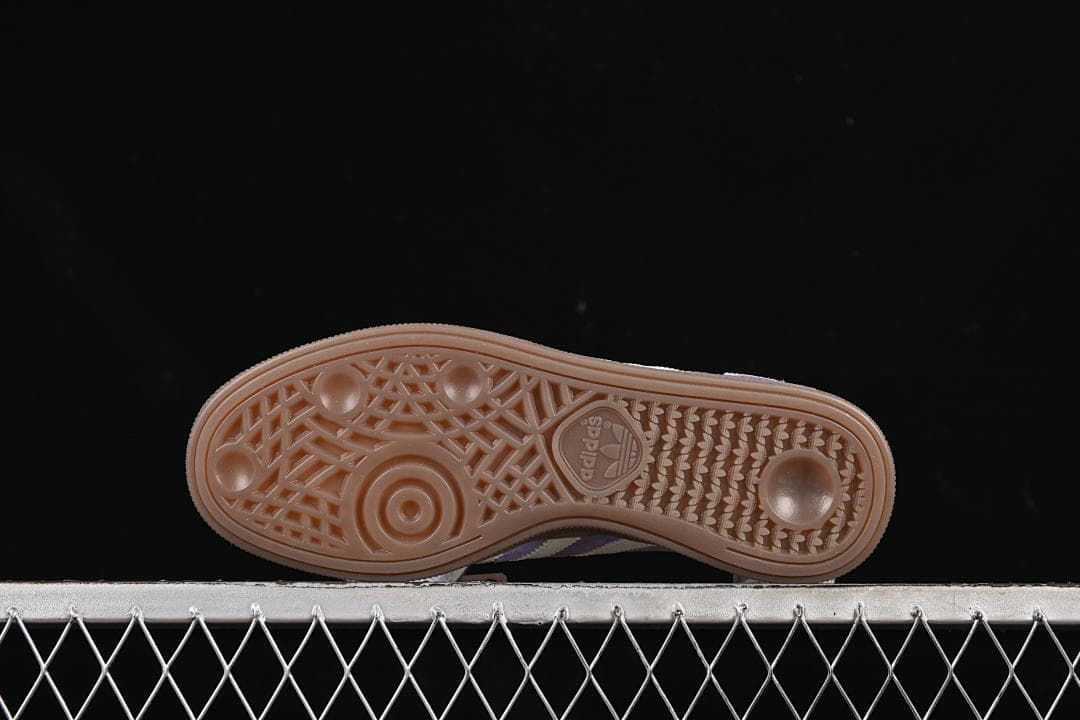 Underside showing the brown patterned outsole