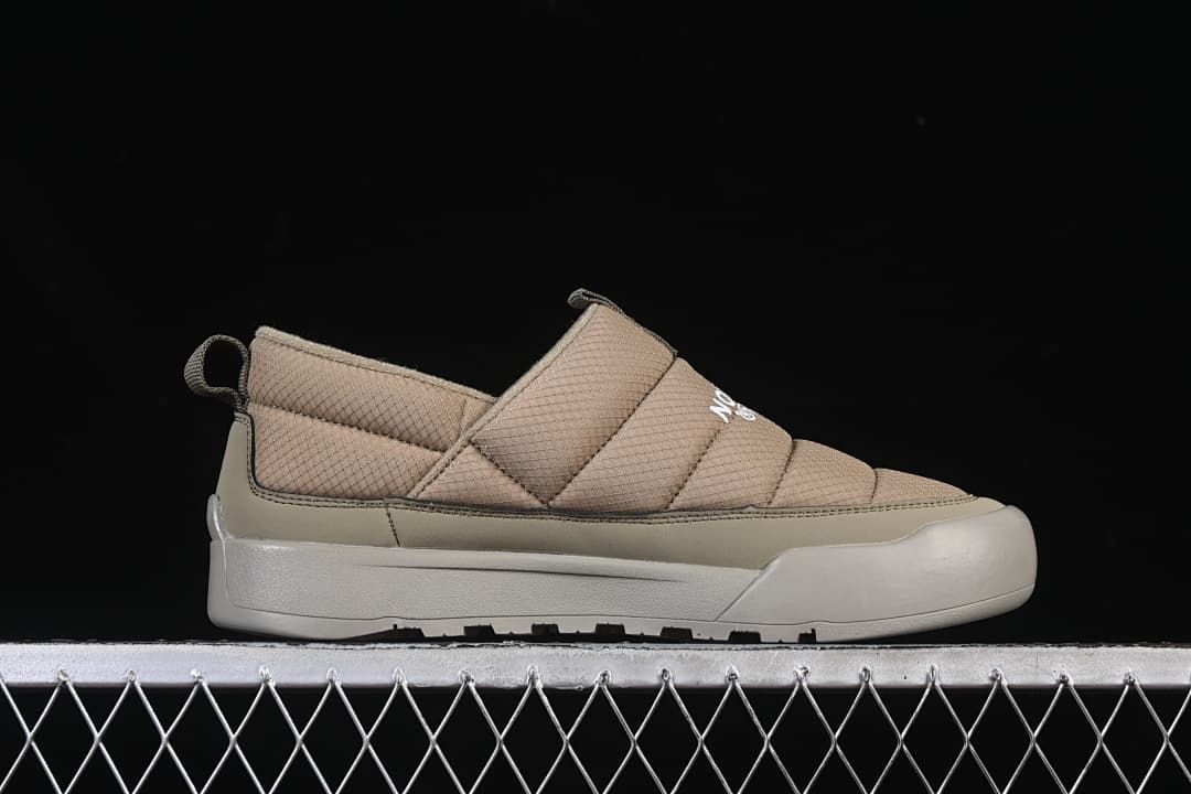 Side profile of the khaki slip-on shoe