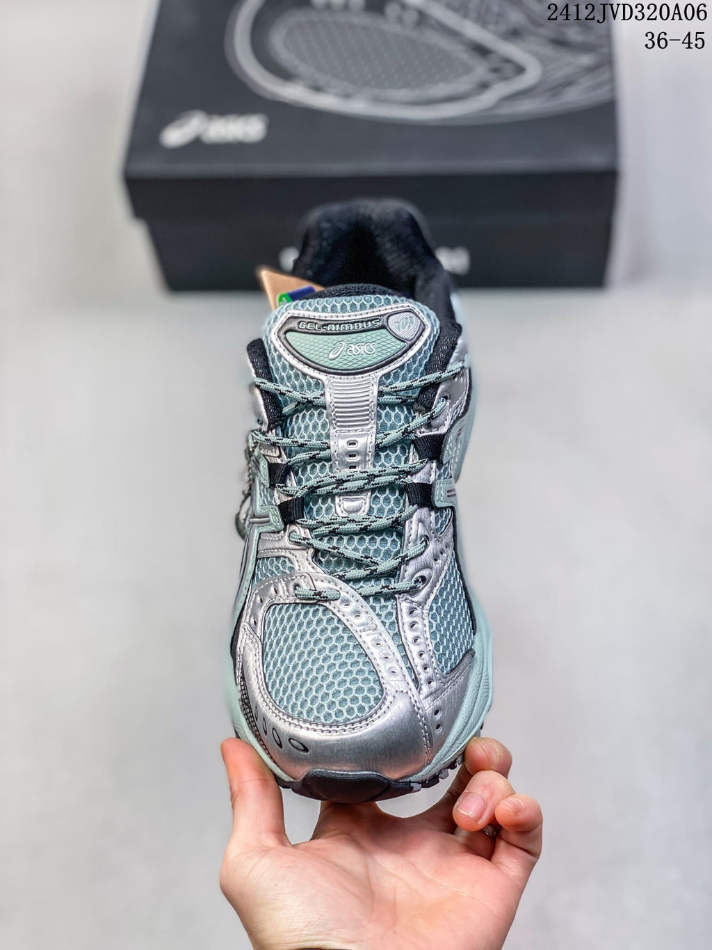Front view of the sneaker showing the laces and layered toe