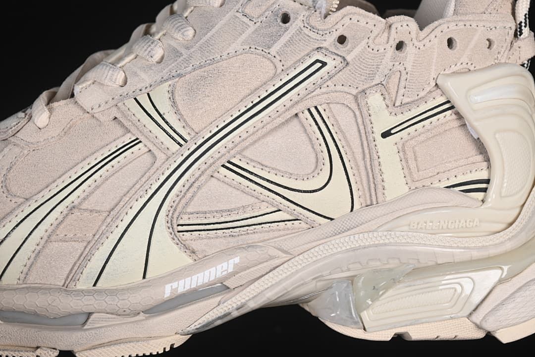 Close-up of layered side panels, line accents, and sole