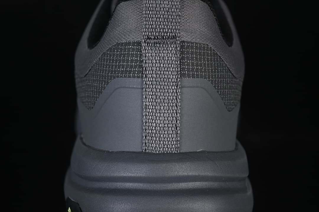 Rear view highlighting the heel pull tab and layered heel construction