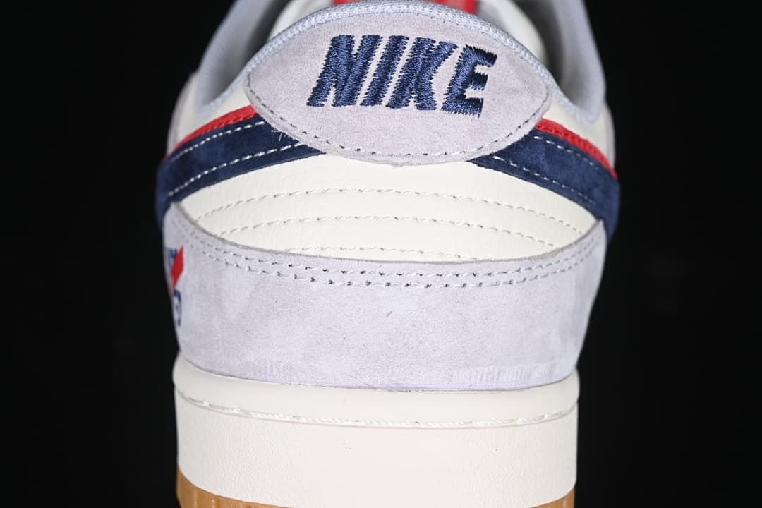 Rear view showing the Nike heel logo, layered panels and gum outsole.