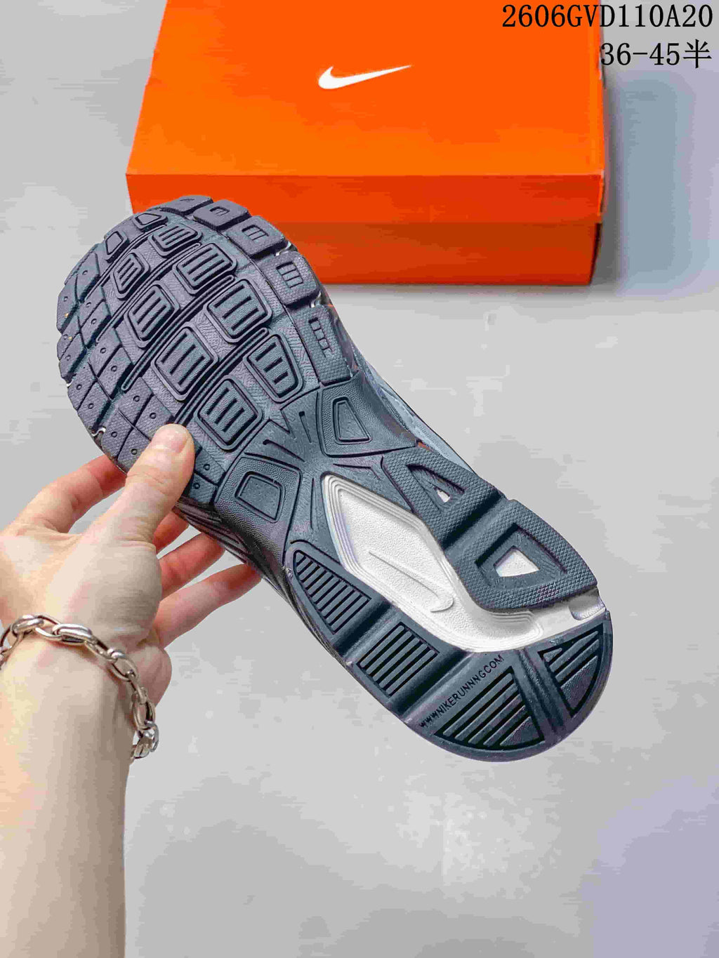 Close-up of the sneaker outsole showing its tread pattern.