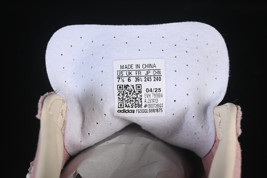 Close-up of the sneaker tongue label with size and product details