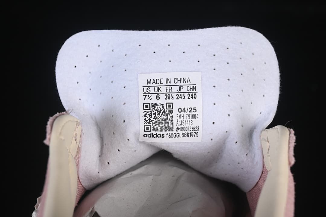 Close-up of the sneaker tongue label with size and product details