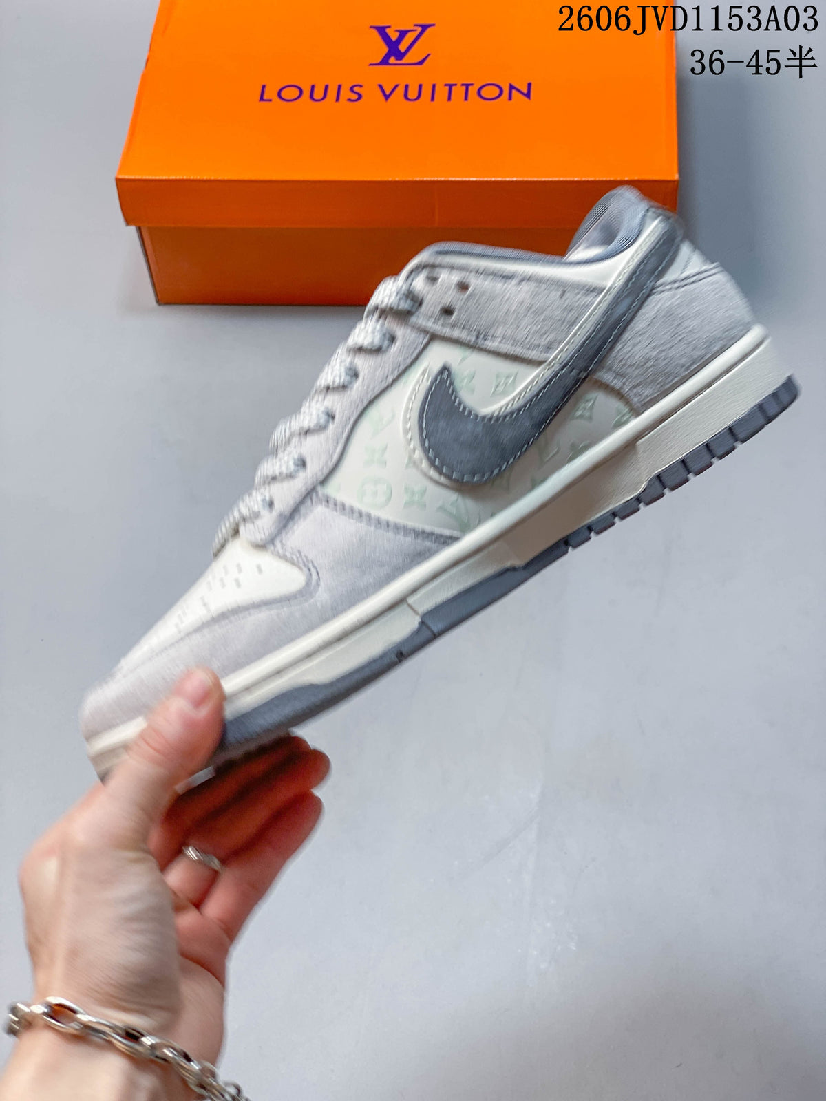Side profile showing patterned panels and layered Swoosh-style overlays