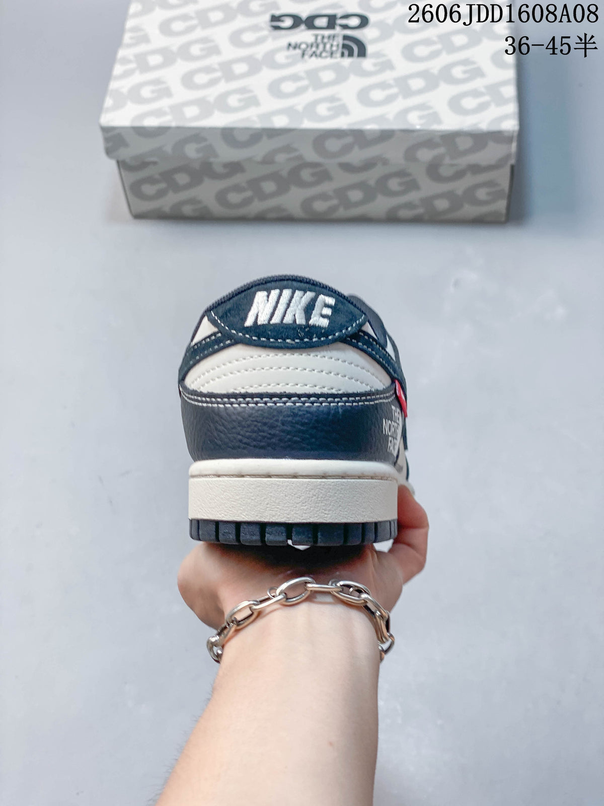Rear view of the sneaker showing the heel panel and contrasting midsole
