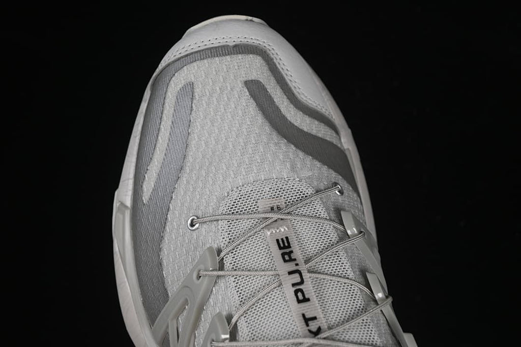 Top view of the toe and lace area with XT Pu.re lettering
