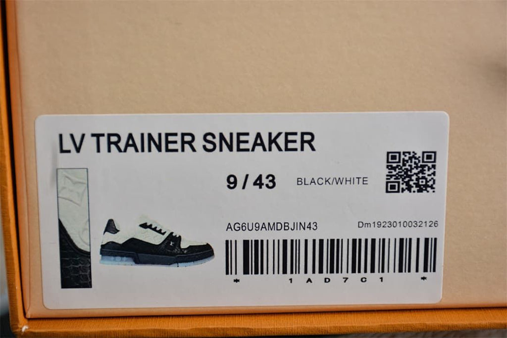 Shoebox label reading LV Trainer Sneaker, size 9 / 43, Black/White.
