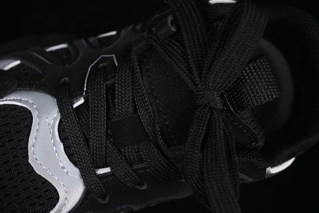 Close-up of the lace-up fastening and tongue