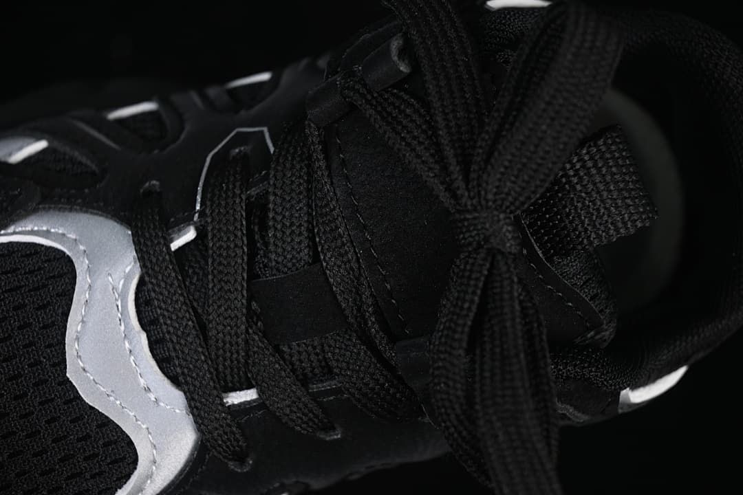 Close-up of the lace-up fastening and tongue