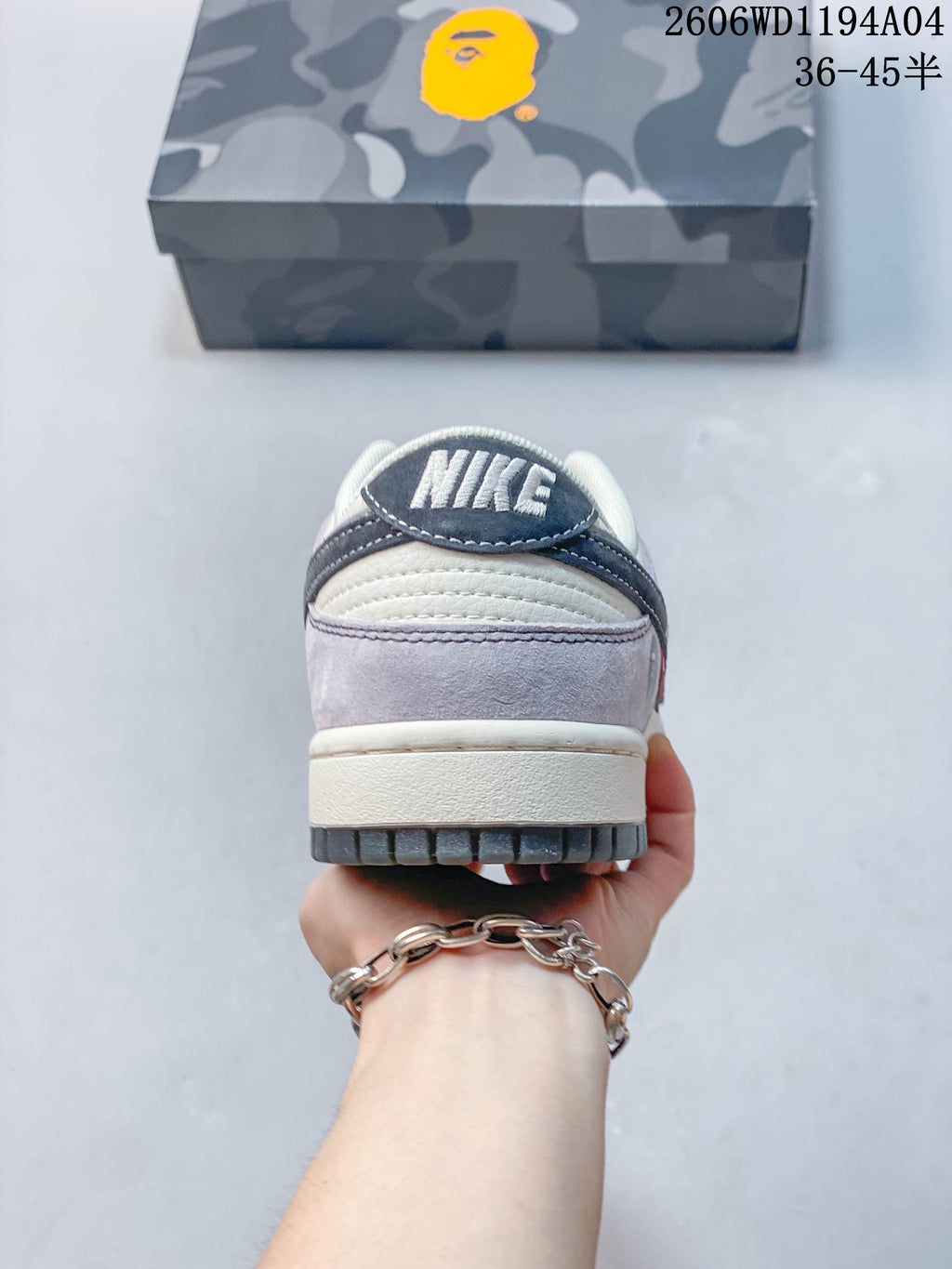 Rear view of the sneaker showing layered heel panels