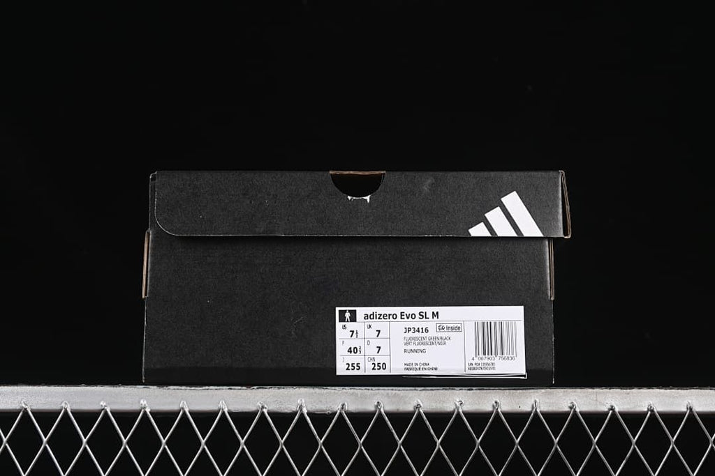 Black shoe box with a label identifying Adizero Evo SL M and style code JP3416.