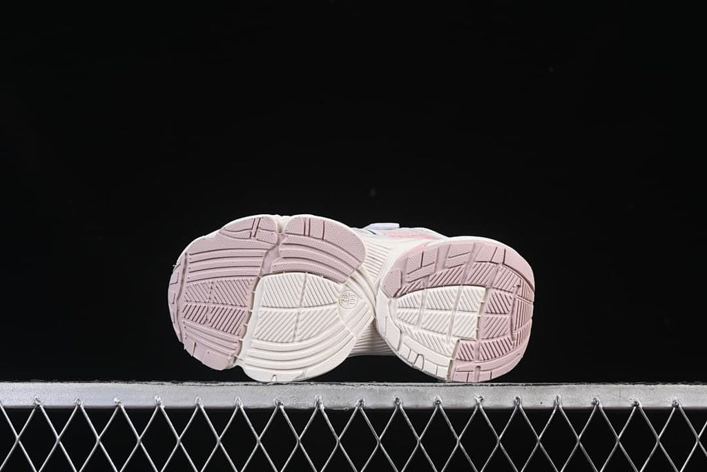 Underside view showing the patterned outsoles