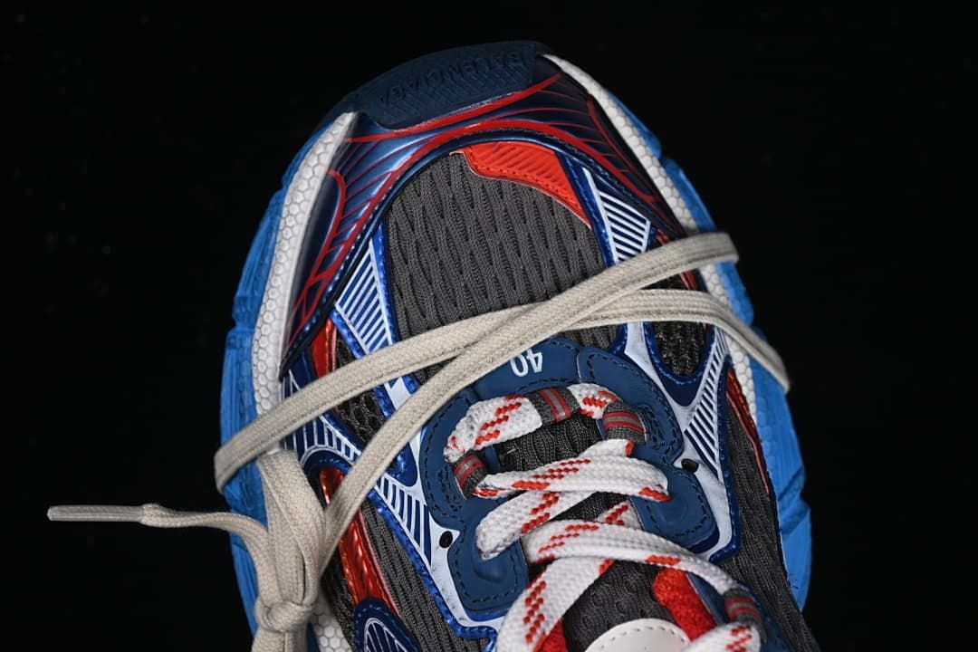 Top-down close-up of the sneaker's toe and lacing