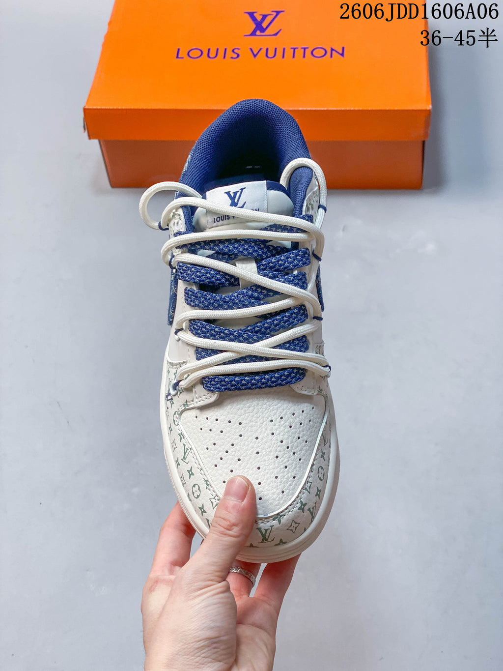 Front view showing the perforated toe and layered laces