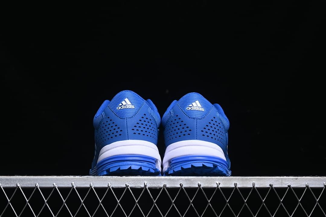Rear view of the pair showing heel panels and outsoles