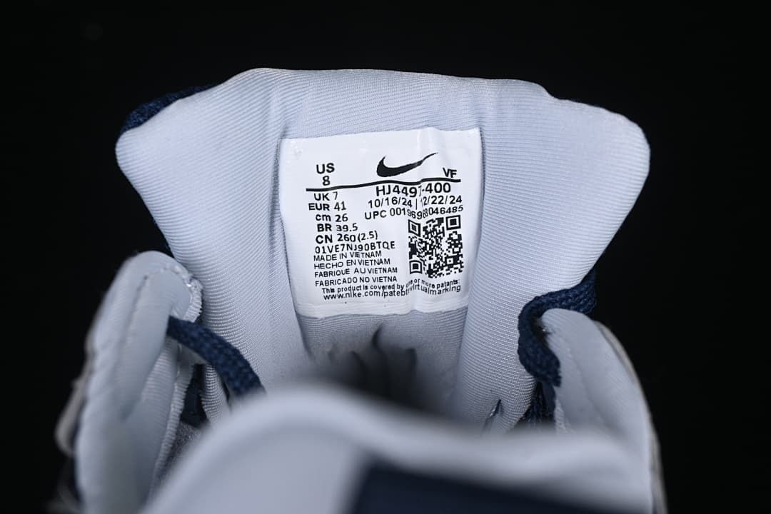 Shoe label showing style code HJ4497-400 and sample size details