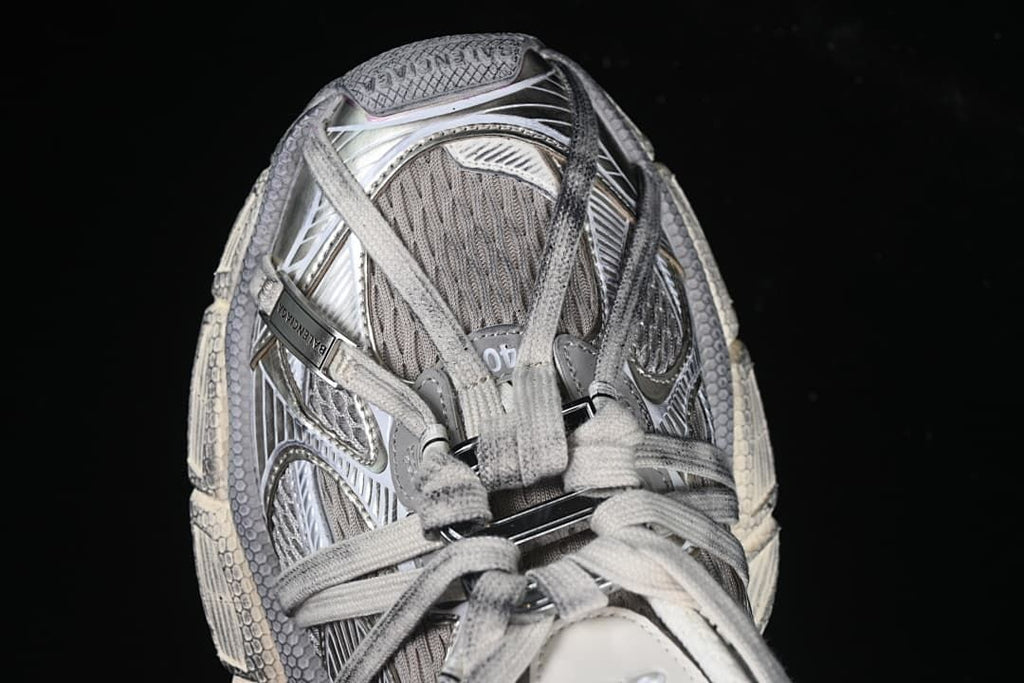 Top view of the sneaker showing its laces and layered upper